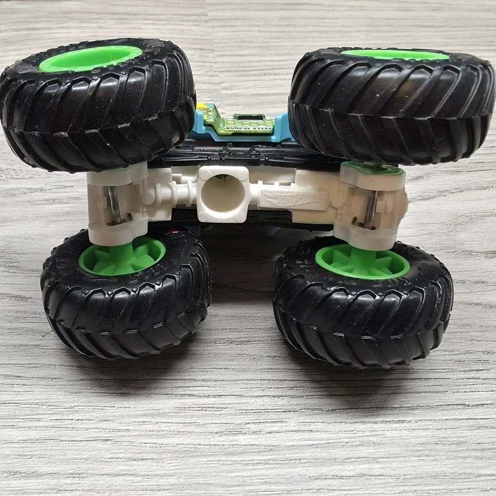 Hotwheels Monster Trucks Lot - Carbonator, Buns Of Steel, Unimog, And Tuk N Roll